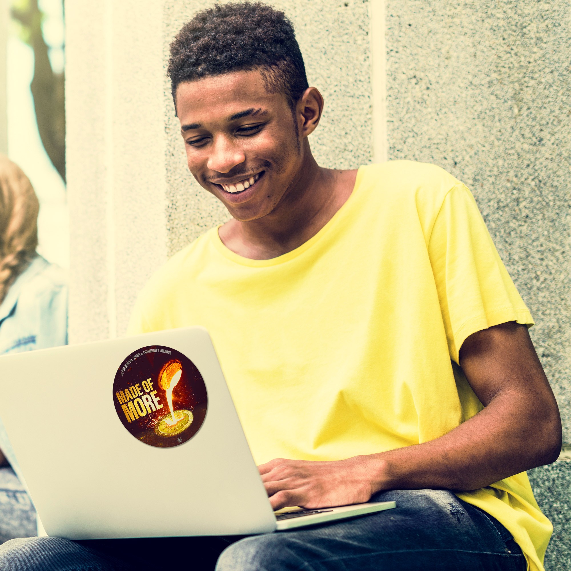 young-teen-using-computer-campus-concept-P82QXZY